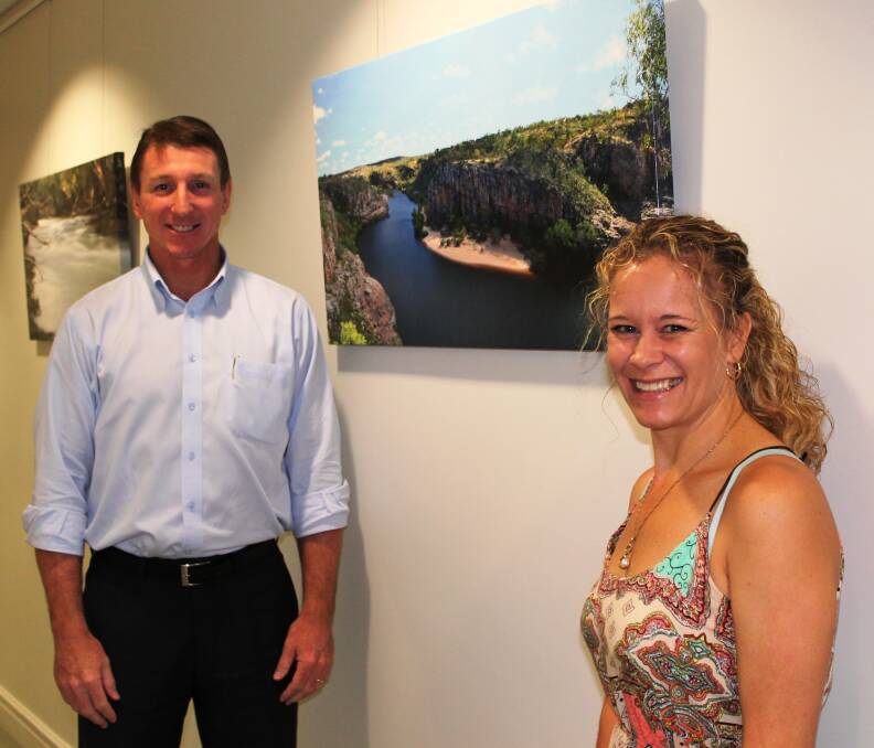 Jodi Bilske with her winning photo of the Katherine River at Nitmiluk Gorge, which is being showcased at Parliament House in Darwin in Willem Westra van Holthe's 'River Corridor'.