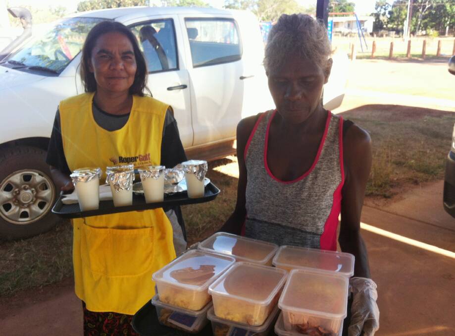 FOOD FOR THOUGHT: Ngukurr Acting Aged Care coordinator Kaylene
Wurramarrba and Community Development Program participant Dianne Thompson
prepare to deliver meals to clients as part of Roper Gulf Regional Council’s
innovative approach to remote Aged Care.