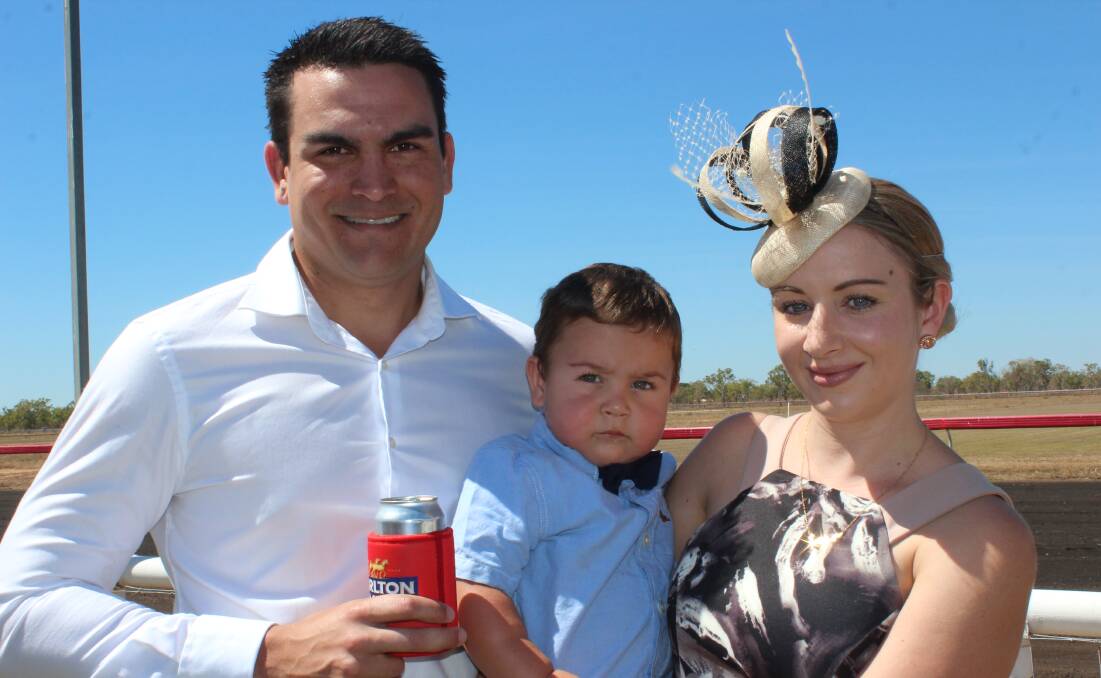 Matt and Gemma Brennan with son Jack enjoying the action at the Katherine Races last year.