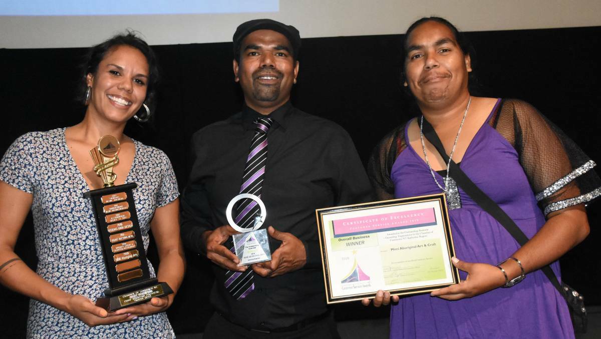 Cassandra Trevilyan-Hayes, Michael Miller and Risha McDonald from Mimi Aboriginal Arts accept the top Chamber of Commerce prize in 2019. Picture: Roxanne Fitzgerald. 