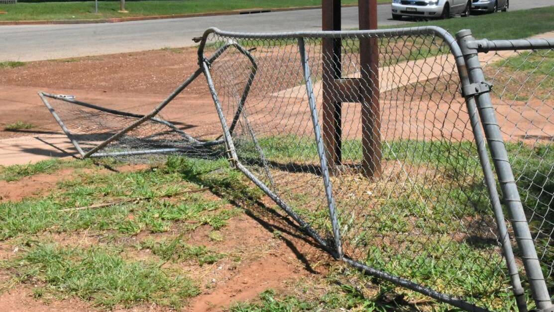 A break and enter on Monday night left the gate of the Katherine Veterinary Clinic damaged, on top of drugs and two cars stolen. Picture: Tom Robinson. 