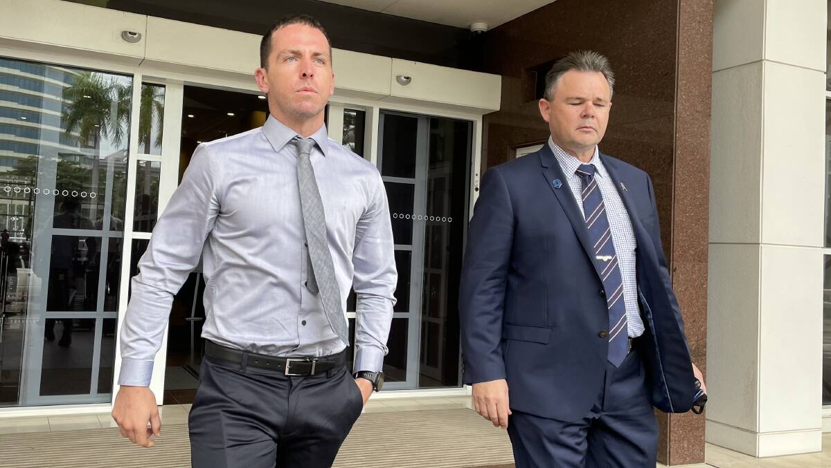 DAY TWO: Zachary Rolfe (left) leaves the Darwin Supreme Court with NT Police Association President Paul McCue on the second day of his trial. Picture: Sarah Matthews
