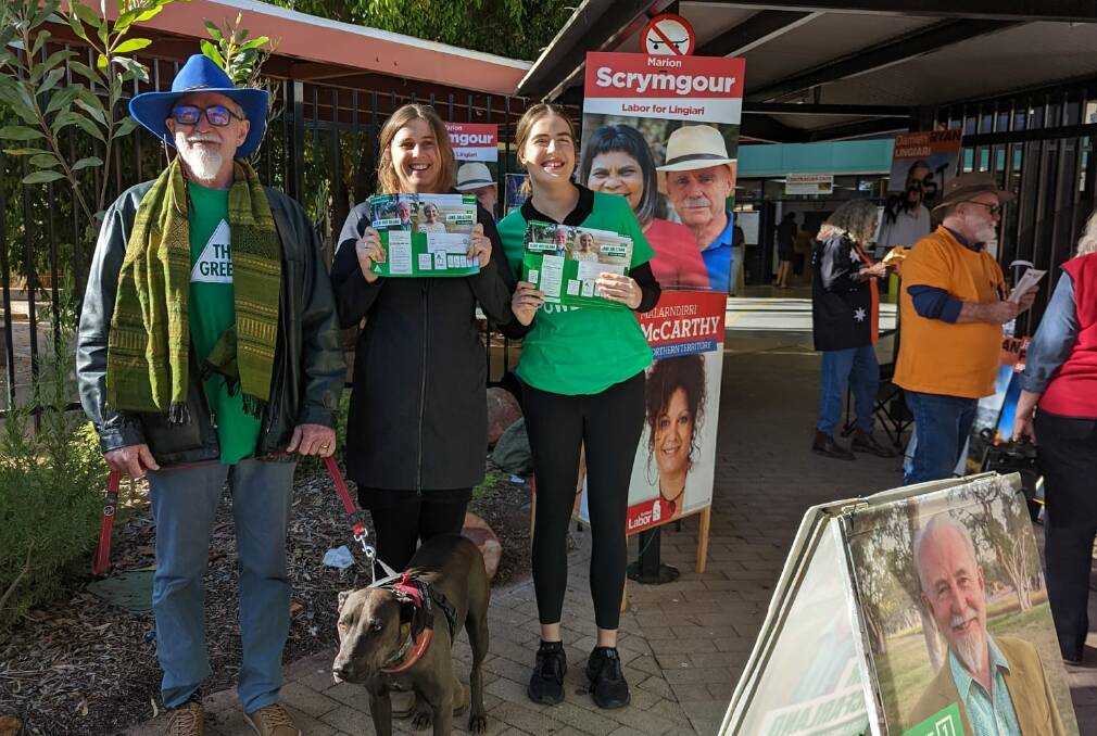 Greens candidate for Lingiari Blair McFarland alongside local volunteers and Chippy the dog. Picture: Supplied