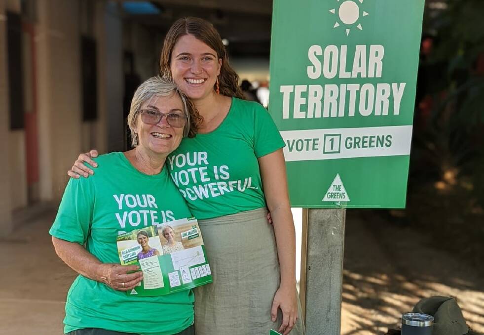 Greens candidate for Solomon Aiya Goodrich Carttling and Senate candidate Jane Anlezark head to their local polling booth at Millner Primary School. Picture: Supplied