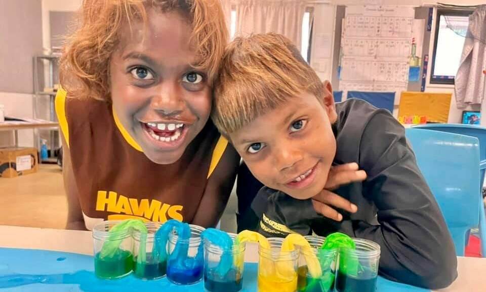Robinson River School students Phoenix and Rodriguez getting hands on. Picture: Supplied