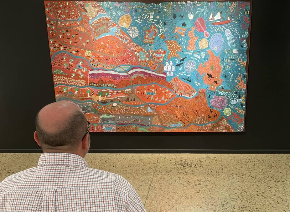 GYRACC Director Eric Holowacz admires the centrepiece work of Four Clans. Picture: Sarah Matthews