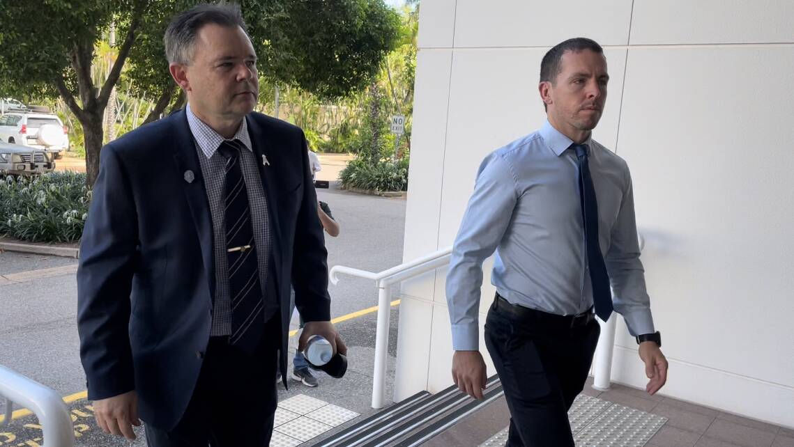 Zachary Rolfe (right) arrives at the Darwin Supreme Court for the second week of his murder trial with NT Police Association President Paul McCue. Picture: Sarah Matthews