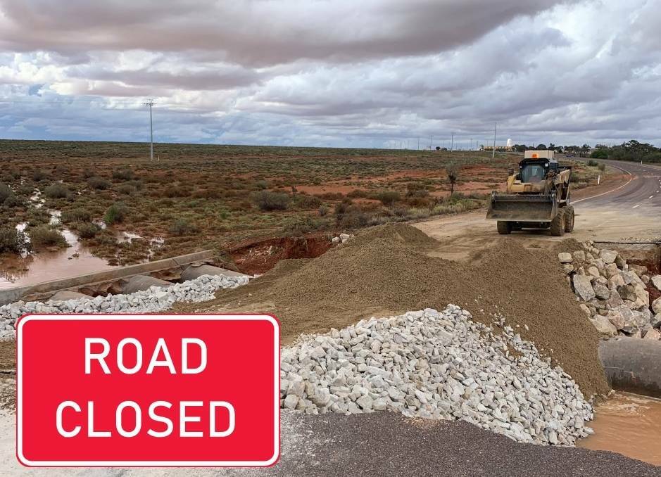 REPAIRS: Contractors work on a temporary fix of roads in South Australia.