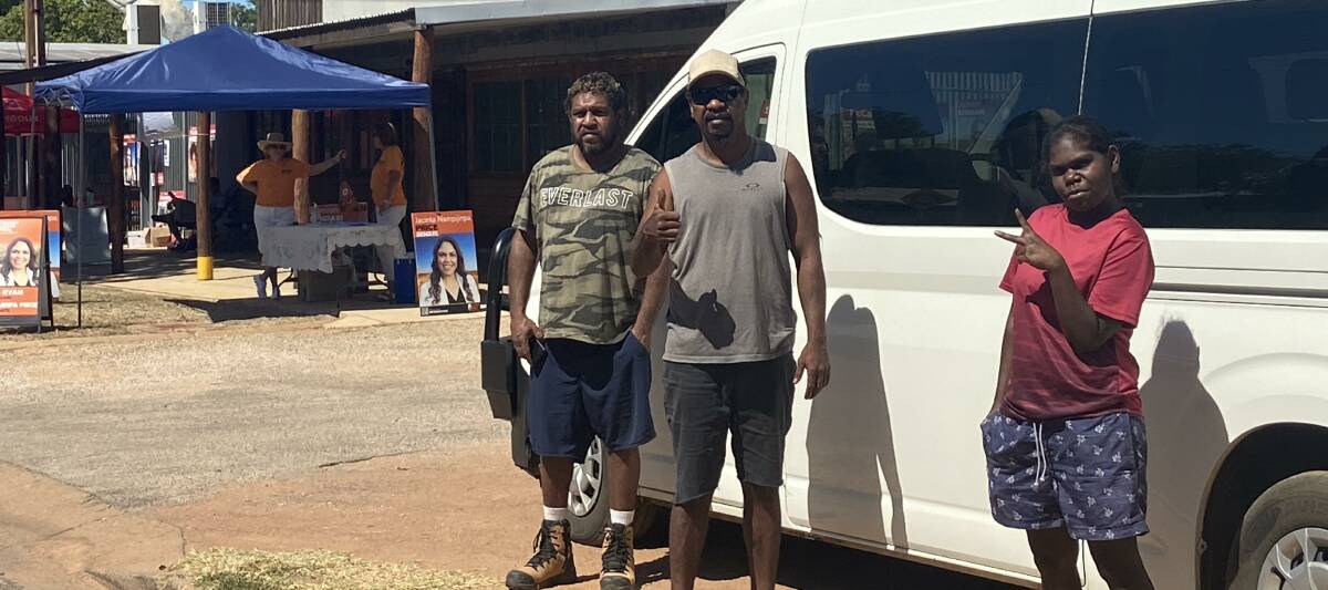 Jawoyn staff members Phill, Jerome and Edwina have been taking community residents into Katherine to vote at the pre-polls. Picture: Supplied