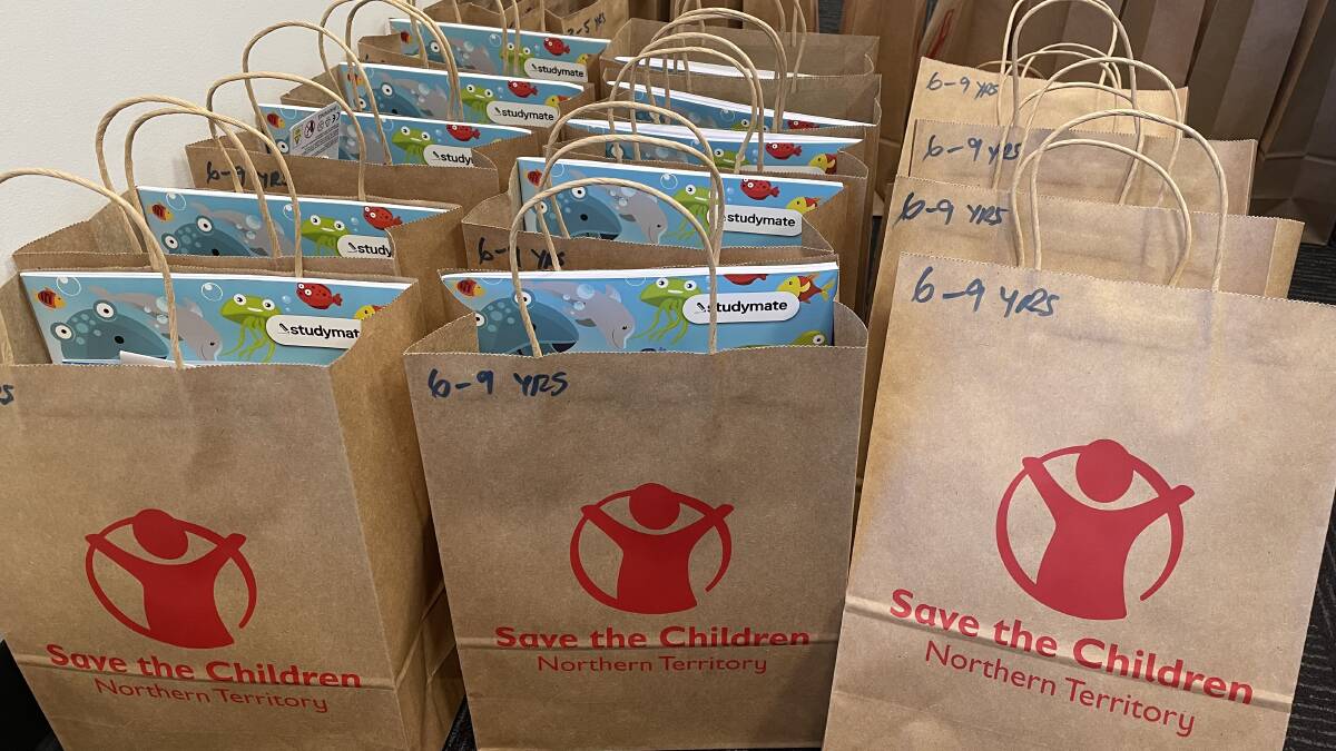 Save the Children are hard at work today making up over 1000 packs. Picture: Supplied