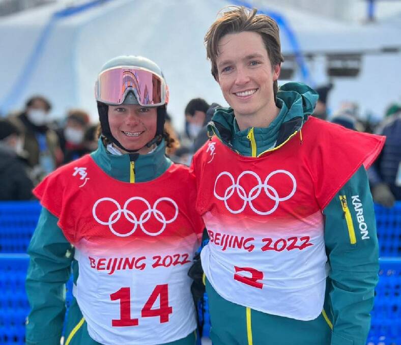  Scotty James (right), 27, and Valentino Guseli (left), 16, smile after getting through the Men's halfpipe qualifiers at the Winter Olympic Games on Wednesday, February 9.