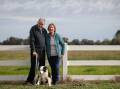 ROAD TO RECOVERY: Carlyle man Mick Humphreys, with wife Jenny and dog, Lila, is pushing for governments to act on delivering vaccines. Pictures: JAMES WILTSHIRE