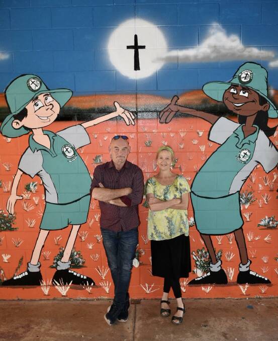 JOB DONE: Jeff "Joffa" Taylor and St Joseph's College teacher Ginny Edwards with the finished mural. Picture: Ginny Edwards.