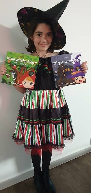 10 year old Rahni, granddaughter of Jenny Duggan, shows off her Book Week costume and birthday gifts. Picture supplied.