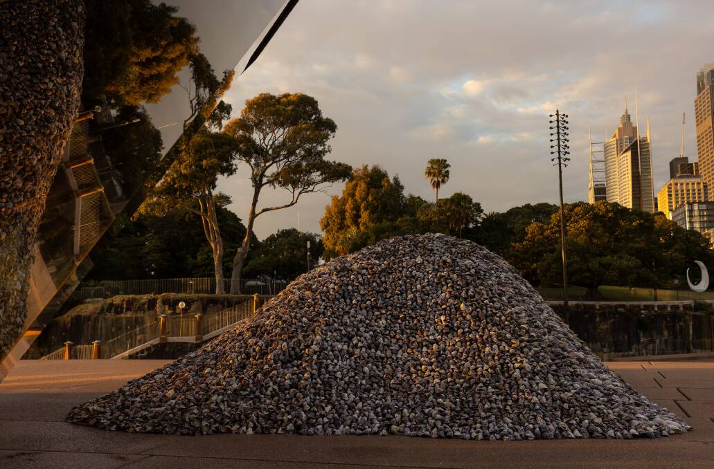 The contemporary midden that artist Megan Cope formed for the 50th anniversary of the Sydney Opera House using oyster shells. Due to its resounding interest with Sydneysiders and visitors, the Sydney Opera House has extended the artwork until November 26, coinciding with Australia's largest on-site and only national dance competition for Aboriginal and Torres Strait Islander groups. It is held on the Opera House forecourt. Picture by Daniel Boud