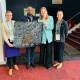 A delegation of the Katherine Accommodation Action Group has presented artwork created by local homeless people to the Federal Minister for Housing. 