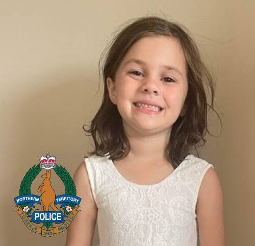 Grace is five years old, has a fair complexion, brown hair and brown eyes. She was last seen wearing a short-sleeved white dress, white socks and black sneakers. Picture: NT Police. 