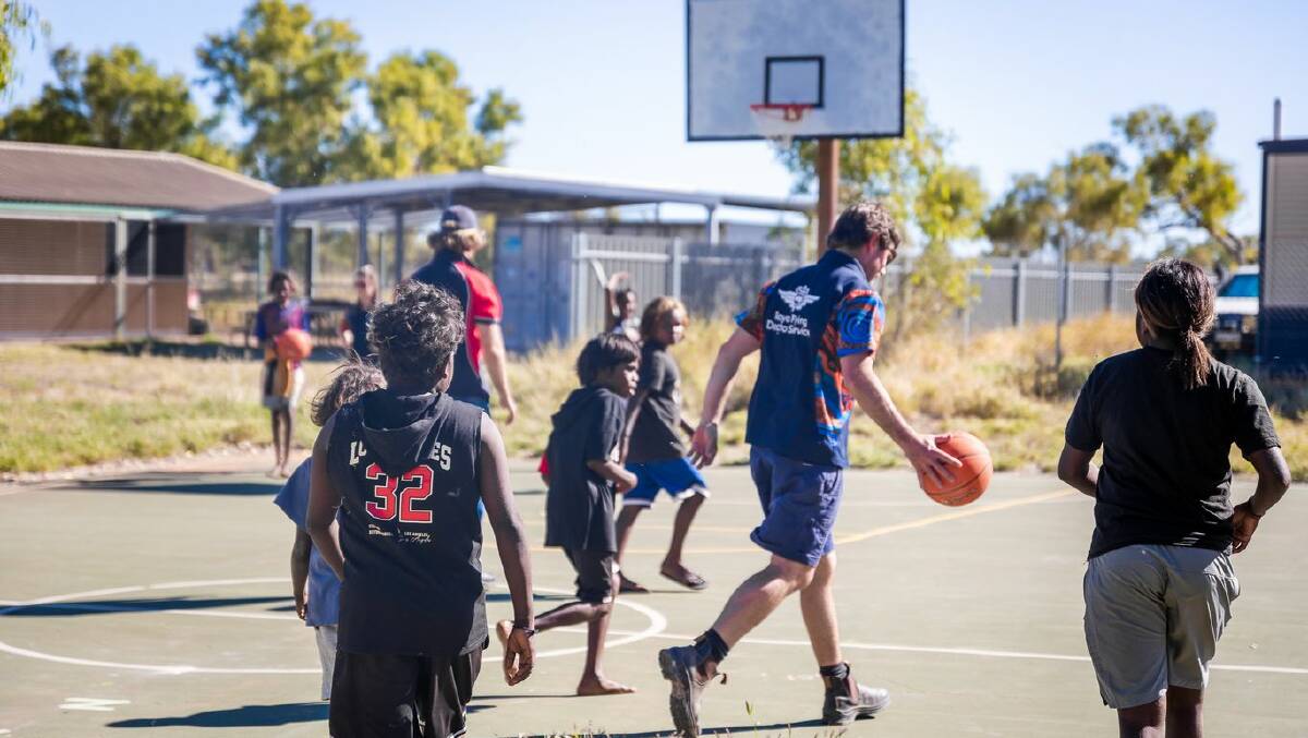 Building trust, familiarity and relationships through a game of basketball.