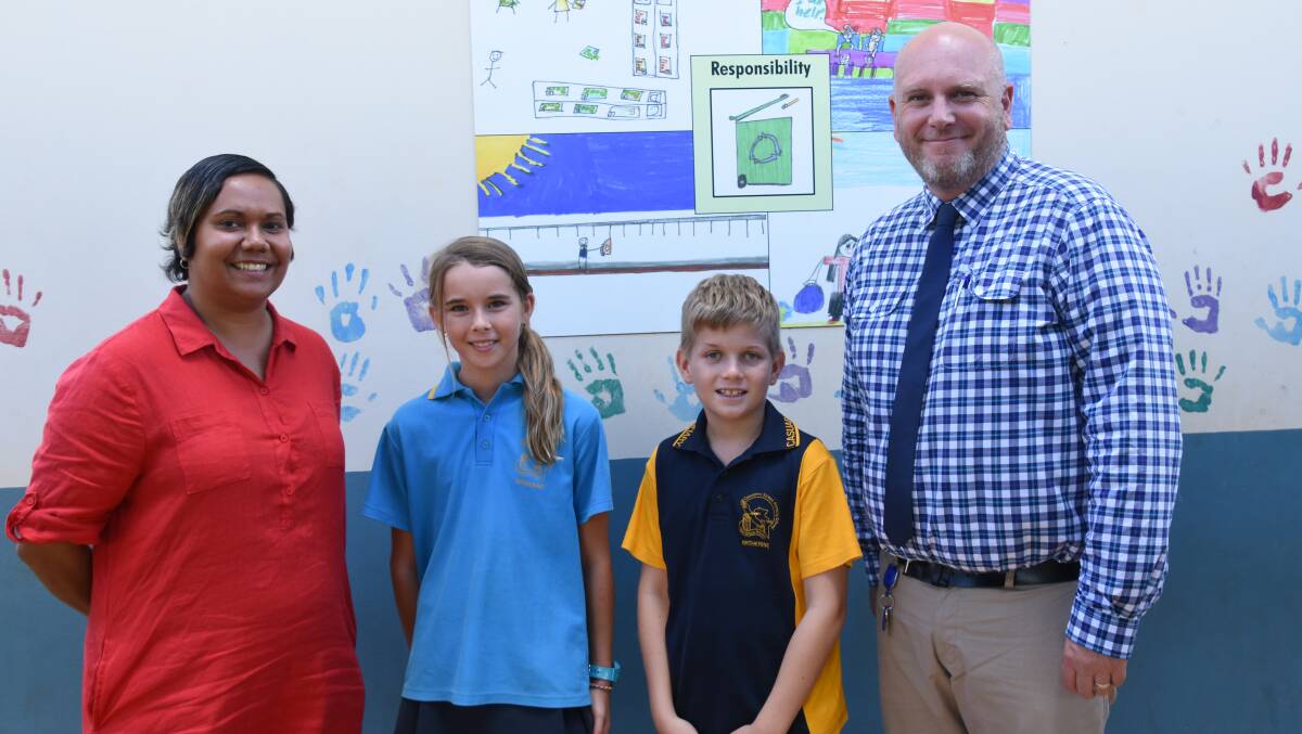 TOP SCHOOL: NT Minister for Education, Selena Uibo visited Casuarina Street Primary School yesterday to see how the students were doing. She stopped by Akira Lawrence, 9, and Arch Howard's, 10, class with principal Nick Lovering to see what they were learning. 
