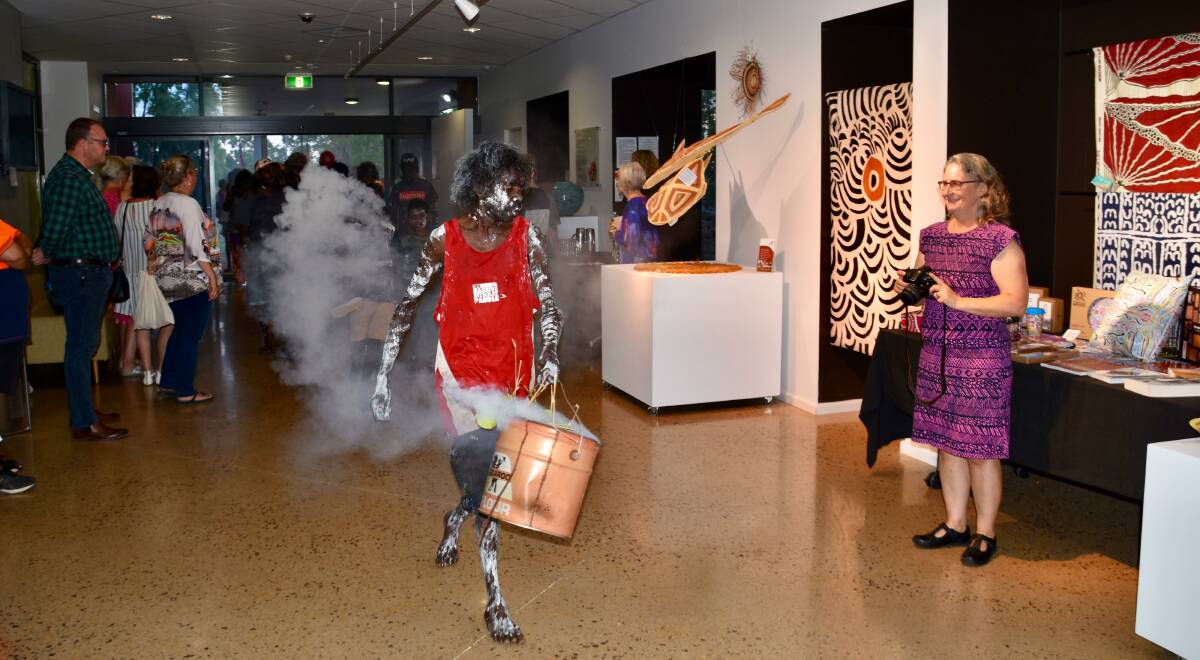 Dancers from Beswick perform a smoking ceremony with Bunggul at the Godinymayin Yijard Rivers Arts and Culture Centre on Friday. 