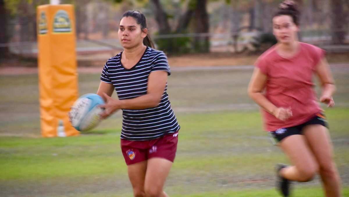 Katherine women's rugby sevens team warm up for their first game of the season, last week. 