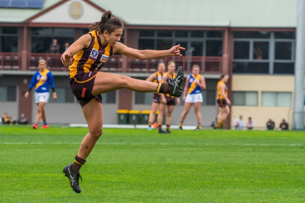 PROMOTING HEALTH: Womens VFL player Rebecca Beeson will be running football clinics and promoting positive wellbeing messages at remote Indigenous schools this week. Picture: Supplied. 