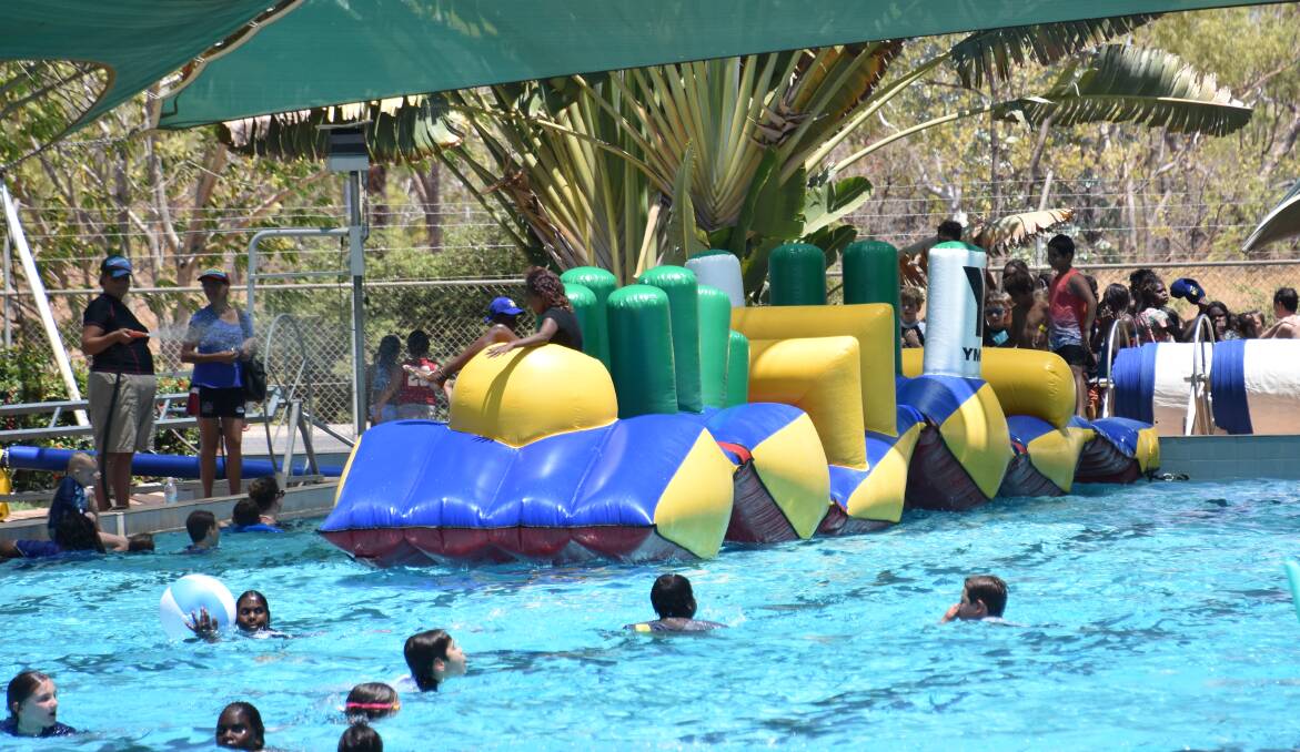 COOL DOWN: Hundreds of children attended today's pool party. 