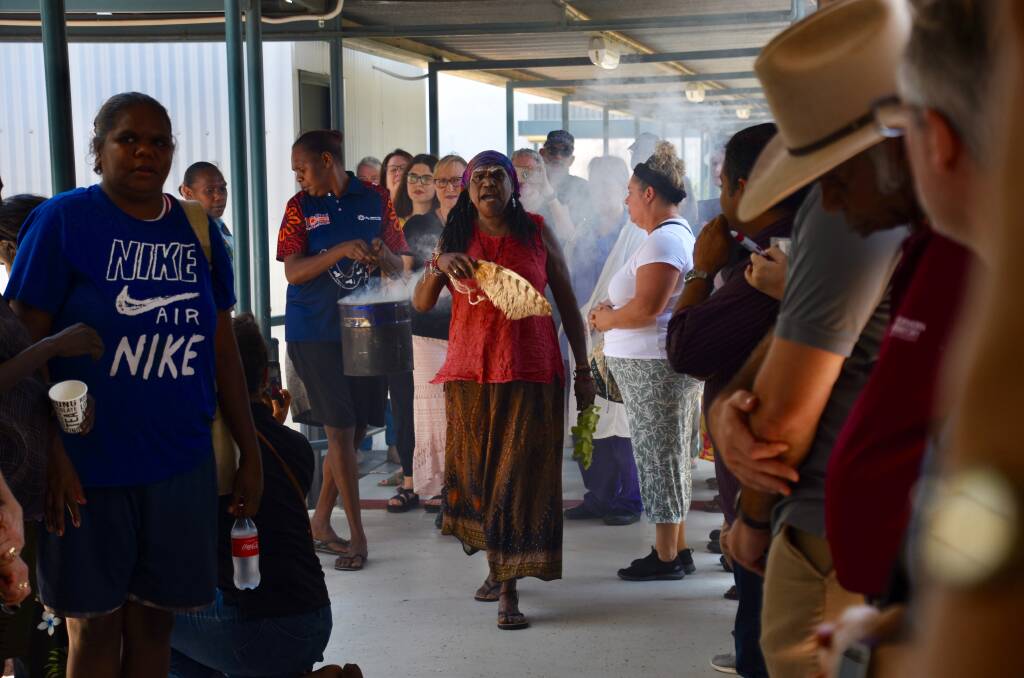 MIlliwanga Sandy Wurrben led a smoking ceremony through the hospital's corridors at the launch. 