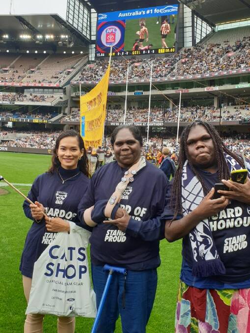 BUCKET LIST: Carer Jen Molato, Peatra Robertson and her sister Gelnda had the experience of a life time at the MCG as Geelong took on the Hawks in last week's game. Picture: Supplied. 