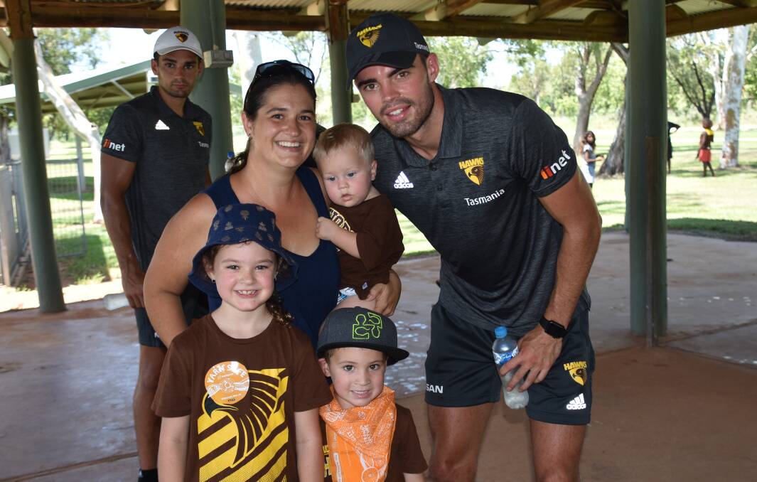 Hawthorn player Conor Nash with Katherine family Rebecca Moore, Sophie Moore, William Moore and Jack Moore. 