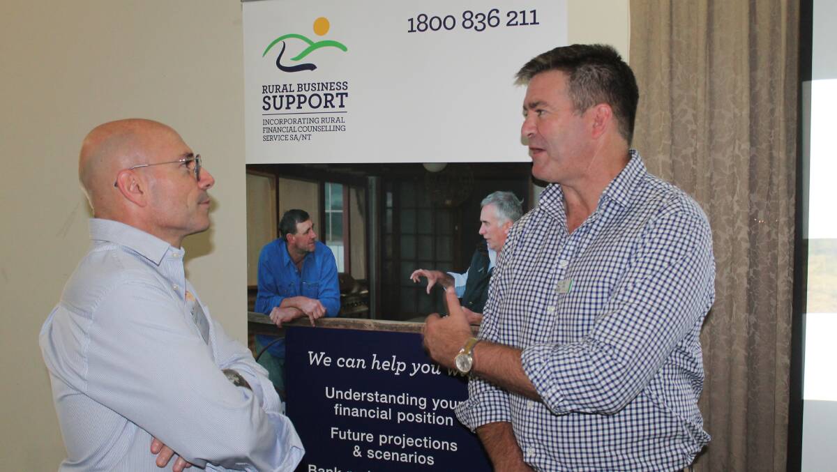 RBS CEO Brett Smith talking with Martin Ferreyra, Austrade's State Director for the Northern Territory. 