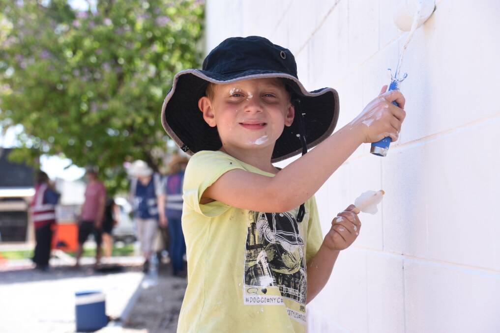 Alex Hard,8, helps out on day one of the school holiday activity. 