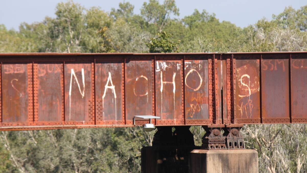 Currently, the only detectable word of the graffiti, spray painted in the 80's, is 'Nachos'. 