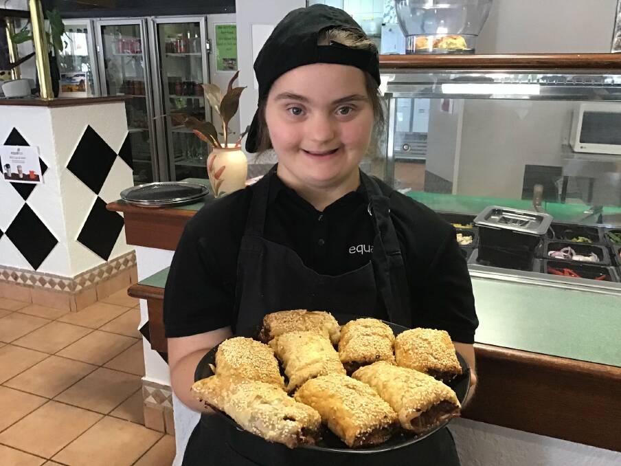 Briony Festing works at Equalitea, an equal opportunity cafe in Katherine, and has mastered the cafe's famous scones, muffins and also sausage rolls. Picture: Supplied. 