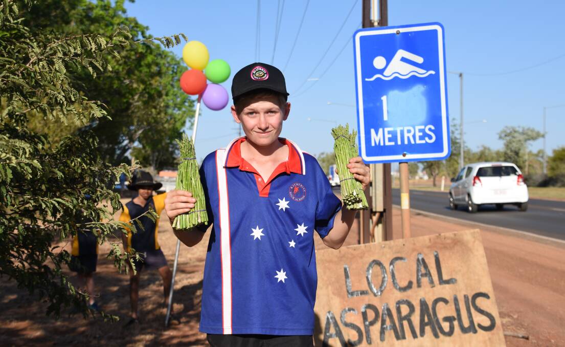 ROAD SIDE ASPARAGUS: Fresh asparagus sales help Leo Howard's dreams of a sport trip to Canberra with the NT Touch team become a reality. 
