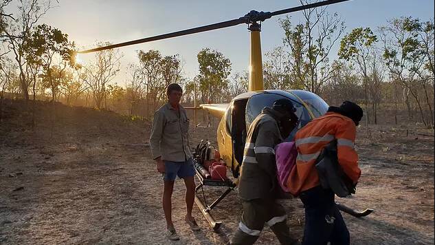 RAGING FIRE: Rangers are hopeful conditions improve as they battle a wildfire raging on the Nitmiluk and Kakadu park boundaries. Picture: Jawoyn Association. 