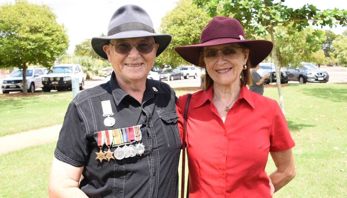 COMMUNITY MEMBERS: Chris and Pamela Dixon at the Katherine Remembrance Day event last year. Chris Dixon wears his parent's medals. 