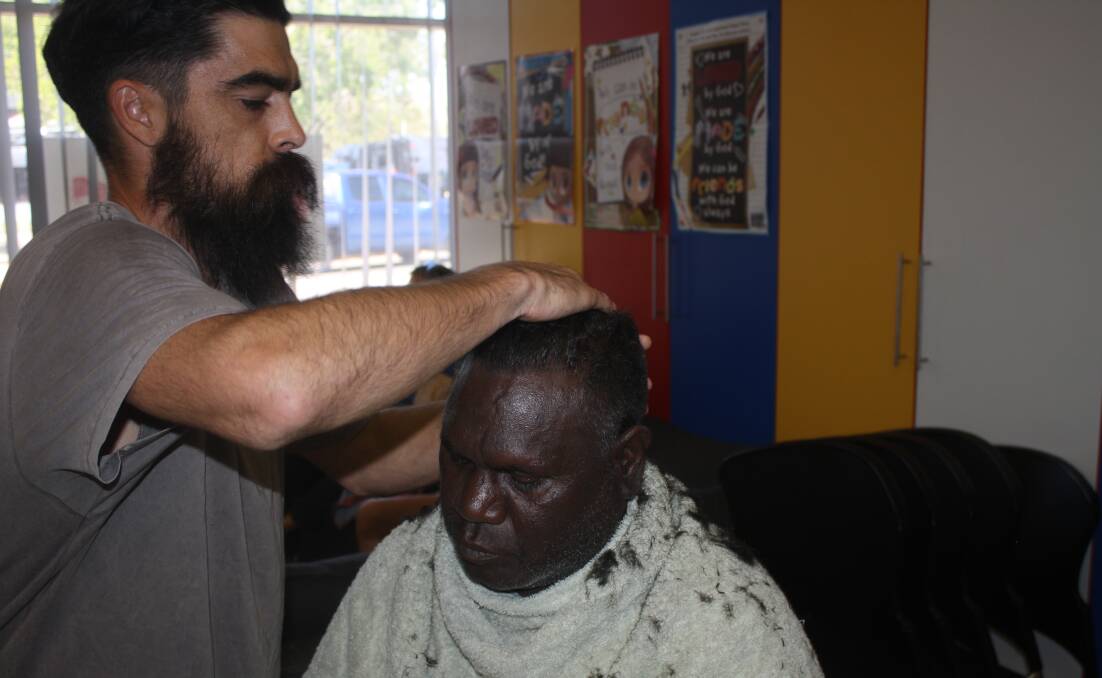 Nathan Fawkner said being a barber is about making someone feel "fussed-over" and confident. 