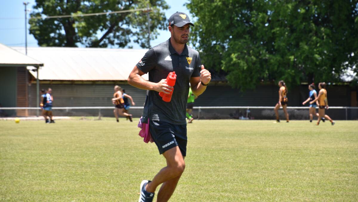 Conor Nash helped out on Saturday at Nitmiluk Oval running water and encouragement to the U18 girls Big River Hawks team.