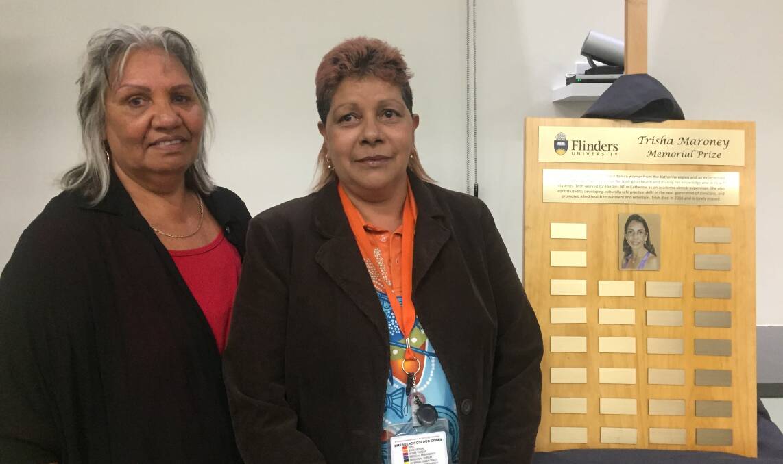IN MEMORY: Dagoman Elder Mary Rosas and NT primary health network's Christine Butler at the launch last night. The Trisha Maroney Memorial Prize will award students with a trophy, a small check and their name will go onto the plague. 