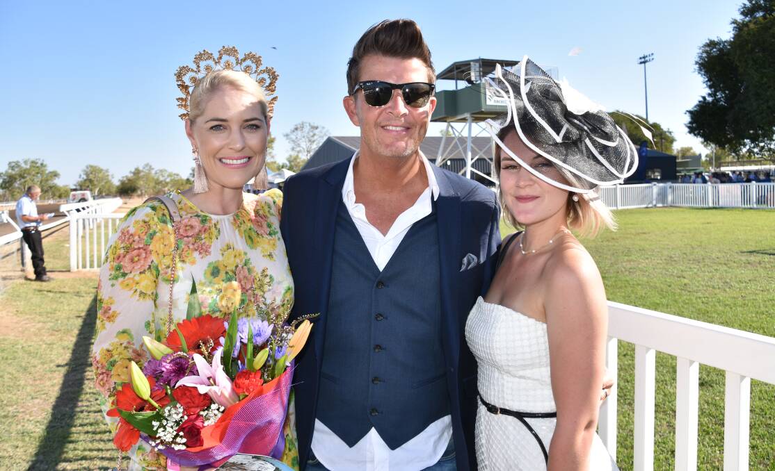 Winner of the Under 30s Fashions on the Field Annabel Curtain, judge Shayne Wicks and runner up Mia Tagell. 