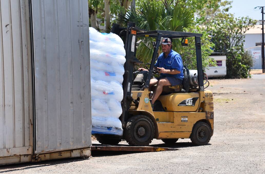 QUICK: When it is hot Katherine Ice Supplies has to work speedily to make sure the ice doesn't melt in the hot sun. 
