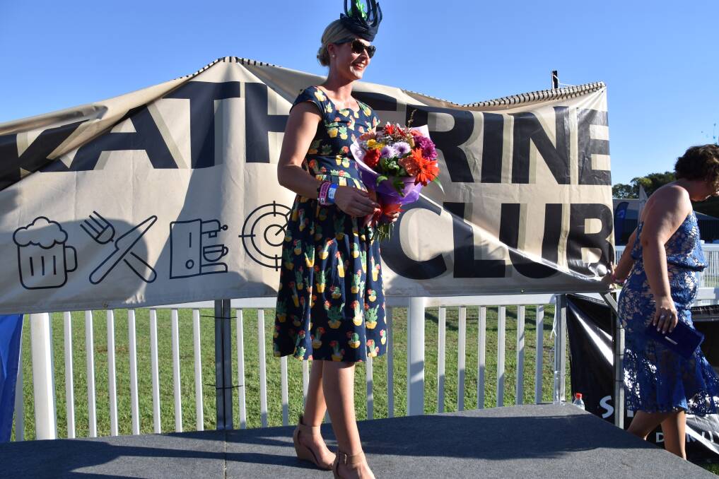 Rowena McCosker wearing a dress and fascinator from Fe's won the Over 30s Fashions on the Field. 