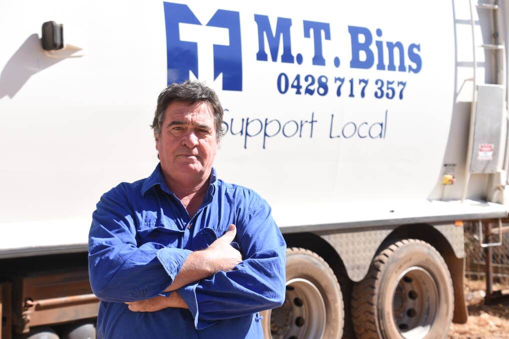 STEEP COST: M.T Bins owner, Michael Knight, said he was not notified about the price change, which will cost his business and his customers. 