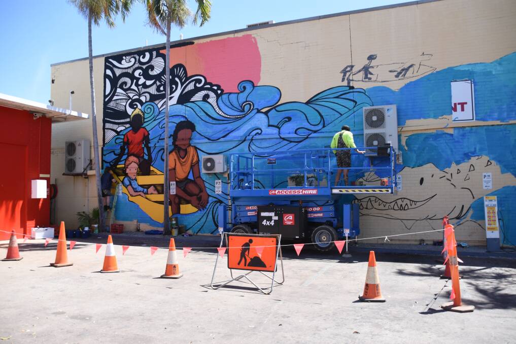 Day two of the Katherine flood mural on Katherine Terrace is progressing well. 