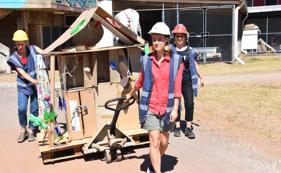 Rachel Platte spent a weekend building her house of junk, and today she moved it through the streets of Katherine to deliver it to the Junk Festival. 