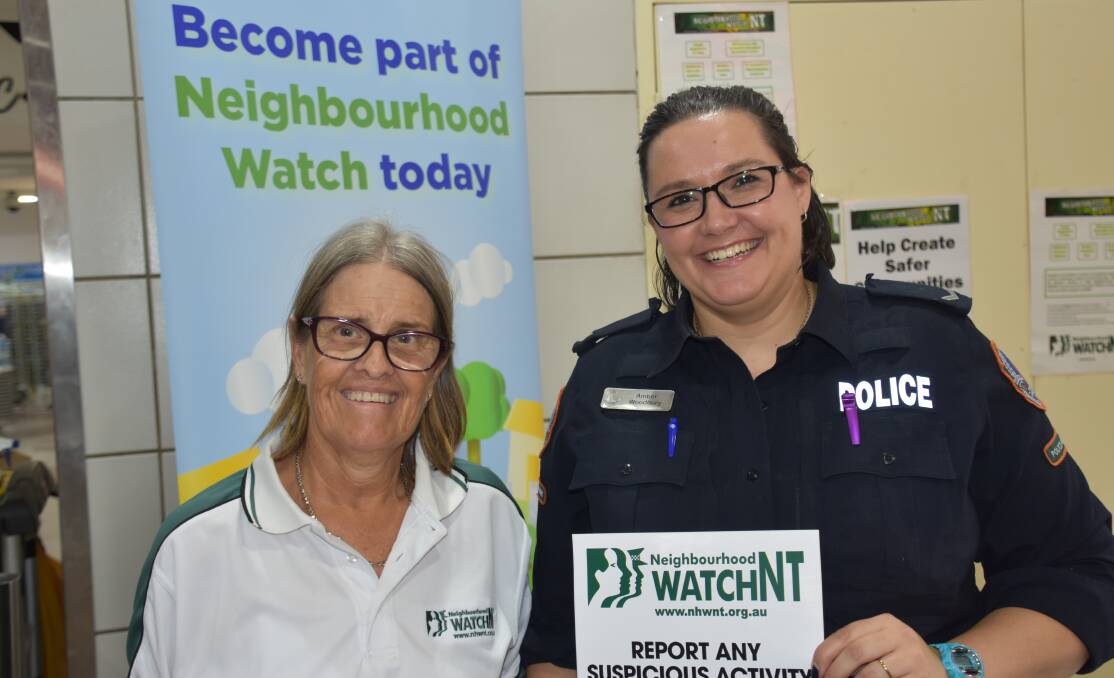 ENGAGEMENT: Jenny Duggan and Katherine Police officer Amber Woodbury talked to Katherine residents about Neighbourhood Watch on Saturday. 