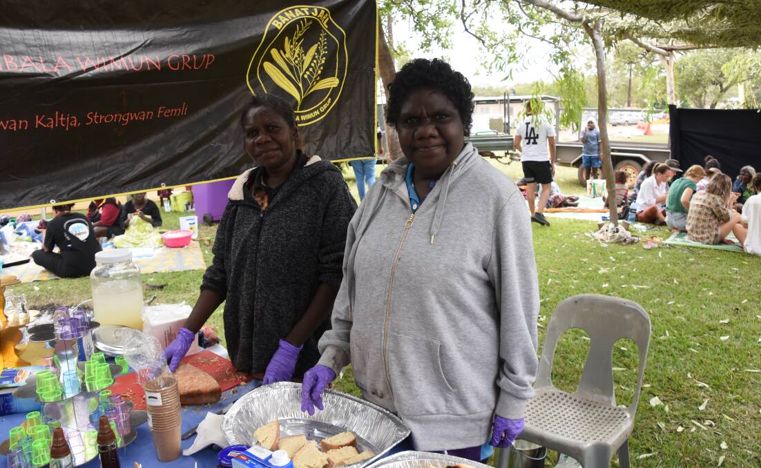 Barunga locals, Revina Fredreicks and Whitney Brinjen served up hundreds of pieces of damper at Barunga Festival. 