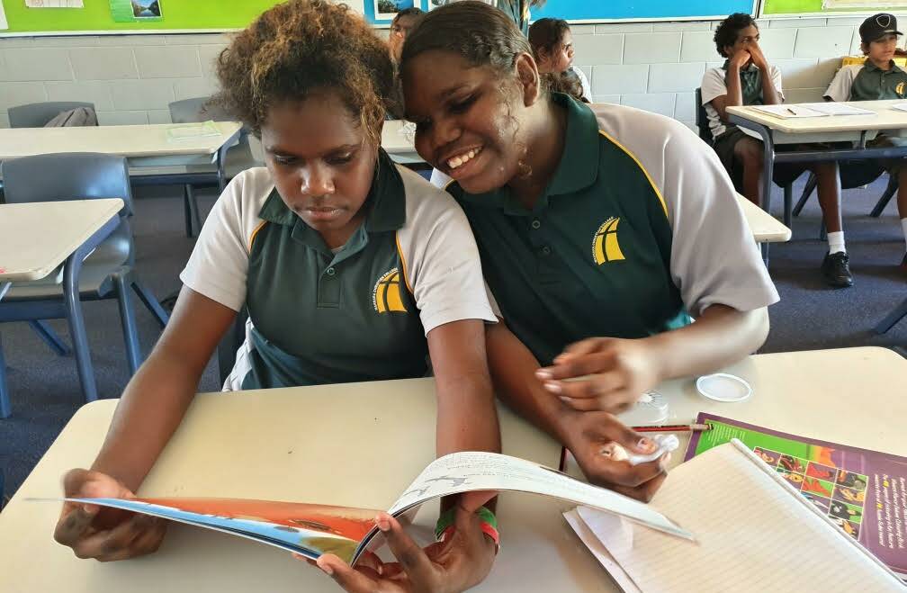 LEARNING: Lena George and Prisaya Ward-O’Keefe enjoying the hunting and tracking adventures in Reading Tracks. Picture: Linda Parkes. 