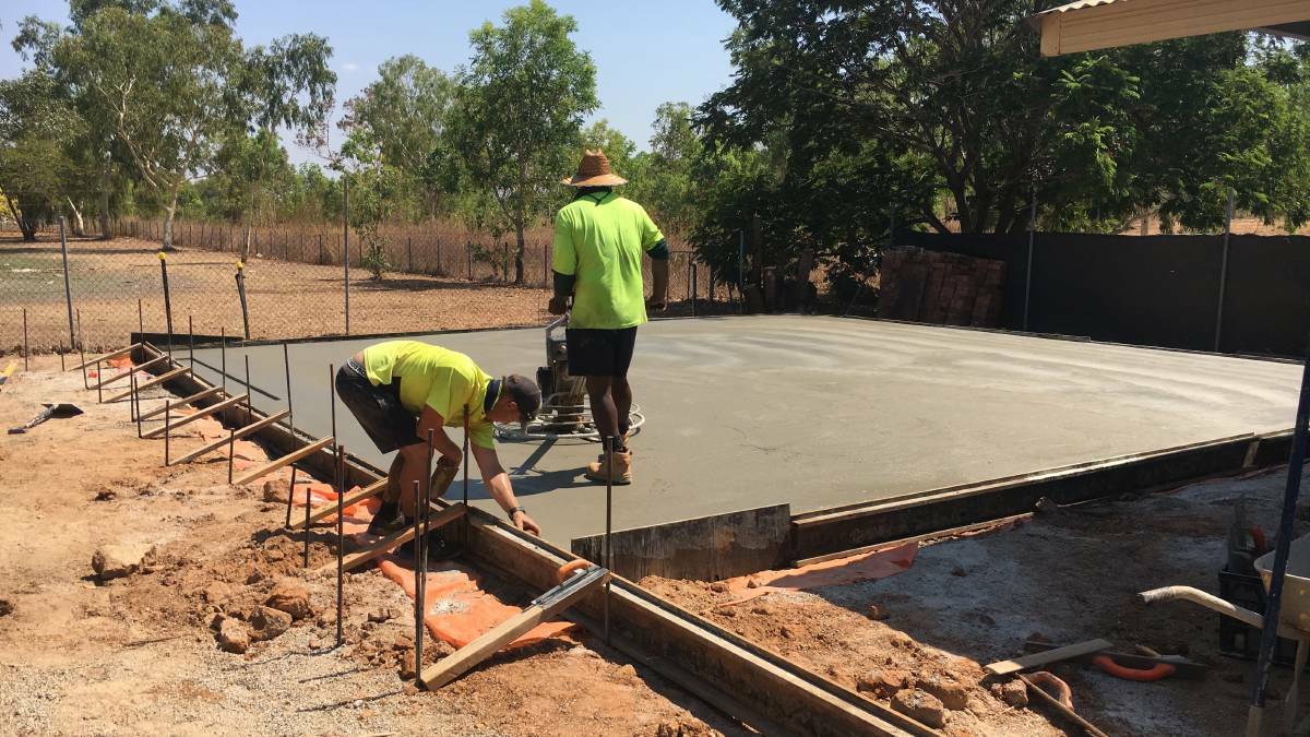 Some of Katherine’s best concreters from Hy-Tech Concrete put down a new pad, forming the base of the shed. There were many other donations from the community. Picture: Men's Shed.